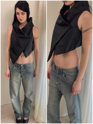 ASYMMETRIC UTILITARIAN TOP